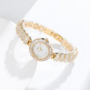 Elegant women's luxury gold quartz watch with dazzling crystal fan links and white dial.