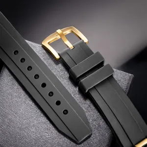 Silicone watch strap replacement black rubber band with gold buckle detail