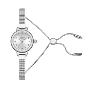 Women's rhinestone quartz watch with adjustable pull chain bracelet strap, elegant silver design.