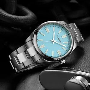 Detail view of the light blue dial quartz watch with luminous markers and stainless steel strap.