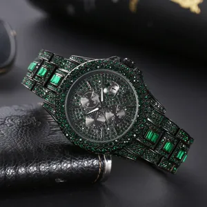 Luxury men's iced out green crystal quartz watch with chronograph and calendar display.