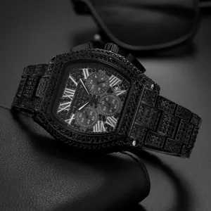 Luxury men's iced out black tonneau quartz watch with roman numerals and chronograph sub-dials.