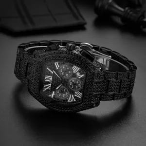Black diamond tonneau quartz watch detail view showcasing iced out dial and roman numerals.
