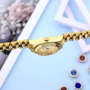 Detailed view of luxury gold quartz watch for women with sparkling diamonds and elegant bracelet.