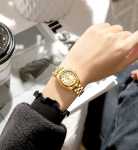 Gold quartz women watch with stainless steel strap sparkling stone markers elegant design 01