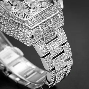 Luxury iced out tonneau quartz watch for men with full diamond paved case and chronograph dials.