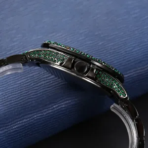 Detailed side view of luxury men iced out rhinestone quartz watch with green crystals.