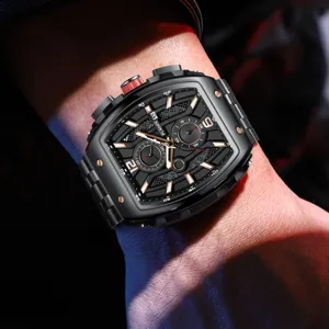 Detailed close-up of PLADEN luxury tonneau men's watch showing skeleton dial and steel strap.