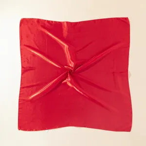 Red satin square scarf, smooth glossy texture, elegant fashion neck accessory for women