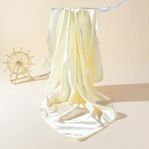 Light yellow satin square scarf for women, simple summer sun protection neckerchief and shawl.
