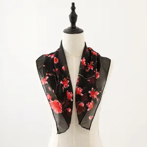 Chiffon square scarf with elegant floral print black and red neckerchief chic accessory.