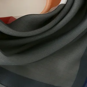 Detailed view of the Korean contrast color plaid square scarf showing soft fabric texture.