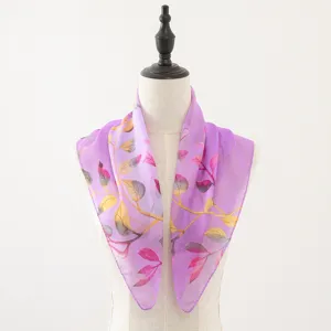 Purple chiffon square scarf detail, elegant leaf print soft neckerchief accessory.