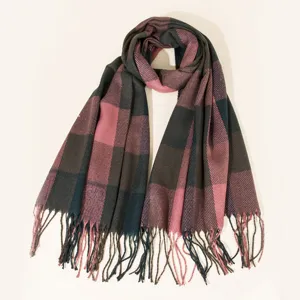 Detailed display of the stylish color-block plaid fringe scarf for autumn and winter warmth.