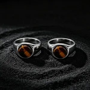 Stainless steel men's ring with natural tiger's eye stone inlay and polished retro finish.
