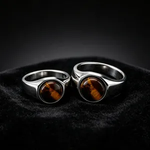 Vintage stainless steel tiger eye stone ring detailed view showcasing glossy finish.