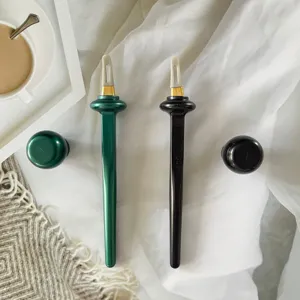 Silicone eyeliner brush detail view, precise tip and smooth handle for easy makeup application.
