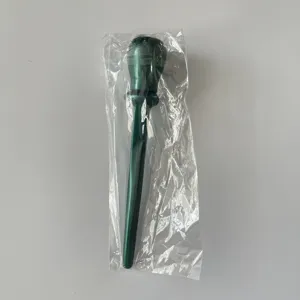 Silicone eyeliner tool detail view, precision makeup applicator in protective plastic bag packaging.