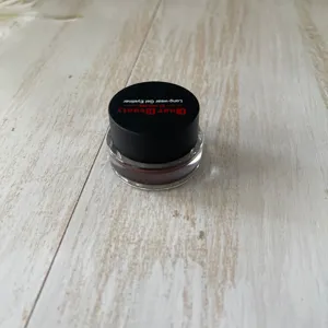 Long-wear waterproof gel eyeliner pot, smooth smudge-proof eye makeup detail view.