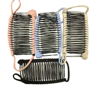 Detail view of elastic double comb banana hair clips in pink, blue, beige and black.