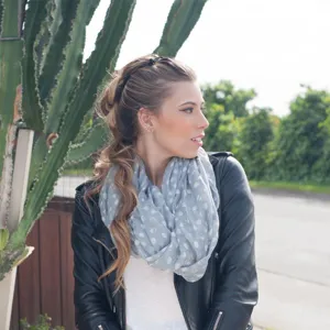 Detailed view of the elegant black banana hair clip worn in a stylish braided hairstyle.