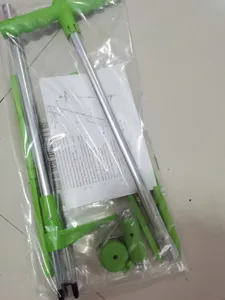 Manual weed remover tool replacement parts with aluminum tubes and green plastic handles.