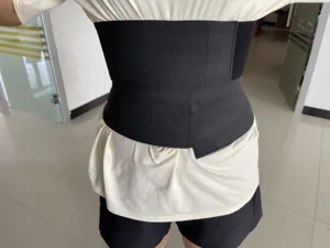 Detailed close-up showing the elastic black waist wrap belt for tummy control and support.