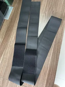 Black elastic waist trainer bandage wrap tummy control belt for yoga and fitness sports.