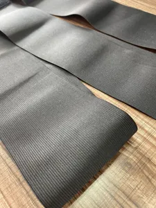 Black elastic waist trainer band detail close-up showing durable fabric texture and fit.