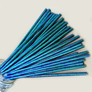Disposable iridescent rainbow paper straws for party drinks, eco-friendly and stylish design.