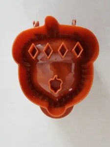 Close-up detail of the autumn acorn shaped hand pie baking mold with cute diamond patterns.