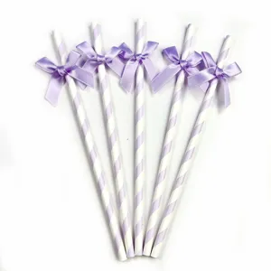 Creative purple bow paper straws for party decoration, birthday and dessert table setup.