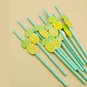 Close up detail of green paper drinking straws with cute tropical pineapple decorations.