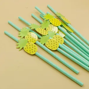 Disposable paper straws with cute pineapple decorations, eco-friendly tropical party drink accessories.