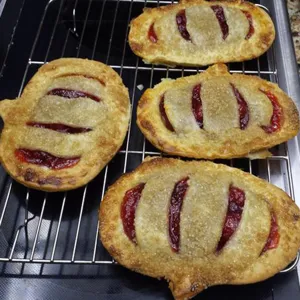 Fall hand pie molds set for baking delicious fruit pastries, pumpkin shape design tools.