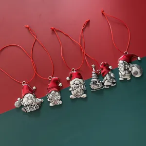 Set of 5 metal Christmas gnome ornaments with red hats, perfect for holiday tree hanging decor.
