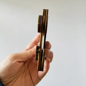 Wooden wedding car money clip detail view, showing multi-layer laser cut wooden craftsmanship.