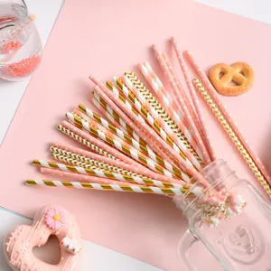 Pink gold paper straws detail view, biodegradable eco-friendly party drinking straws set.