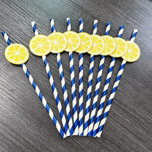 Blue and white striped paper straws with lemon slice decorations for party dessert table decor.