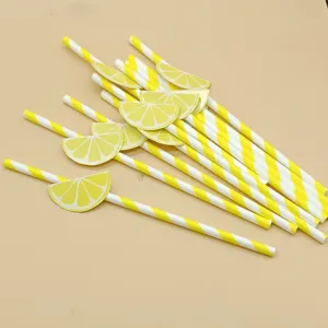 Detailed close-up view of yellow white striped paper drinking straws featuring lemon charms.
