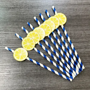 Detail view of blue and white striped paper straws with cute yellow lemon decor for party.