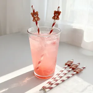 Bear decorated paper drinking straws detail shot, perfect for parties and summer drinks.