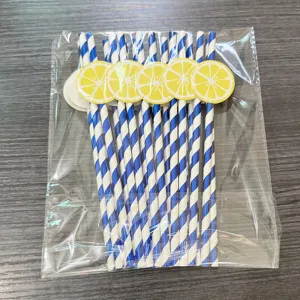 Detail view of blue and white striped paper straws with yellow lemon decorations, clear bagged.