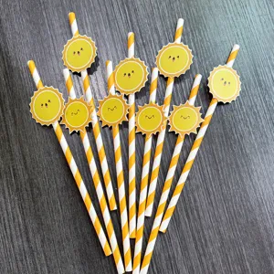 Creative paper drinking straws with cute sun decoration for party table and dessert decor.