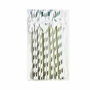 Decorative striped paper straws with white bow detail for party and dessert table decoration.