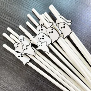 Halloween paper straws with cute ghost decorations, perfect for spooky party dessert table decor.