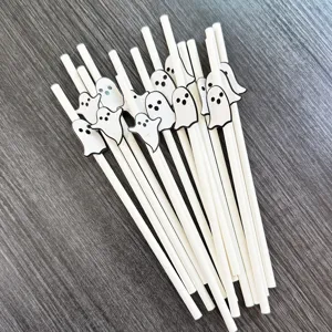 Halloween paper drinking straws with cute ghost cutouts for spooky dessert table decor.
