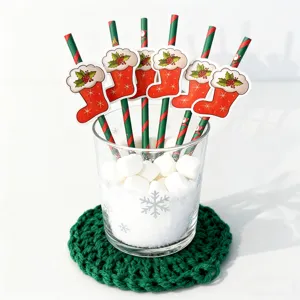 Christmas decorative paper straws with cute stocking cutouts, ideal for holiday party supplies.