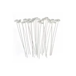 Quick button fasteners detail, white plastic no sew pins, convenient clothing repair accessory.