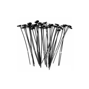 Detail view of black plastic fast button pins, convenient sewing accessories for quick repairs.